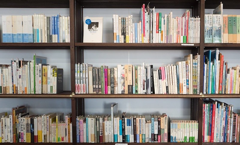 A packed bookshelf A packed bookshelf